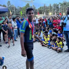 One of our academy's athletes after winning two gold medals in a roller skating championship. This demonstrates our capability in managing and supporting athletes across different sporting disciplines.