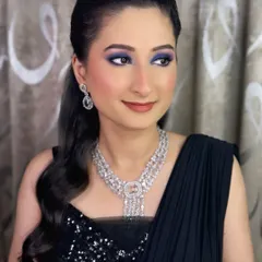 For the cocktail night, we went all in with a bold, blue smokey eye. This look is for the fashion-forward bride who wants to make a statement.