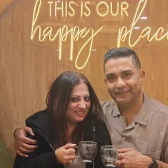 A couple takes a moment to relax with a warm beverage after their treatments. My goal is to create a space where you can comfortably reconnect.