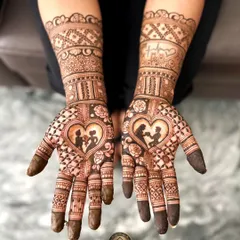 I love creating personalized engagement henna that tells a couple's story. This design features silhouettes of the couple inside a heart, surrounded by delicate rose patterns. On the forearm, I added a heartbeat line with their initials to make it extra special.