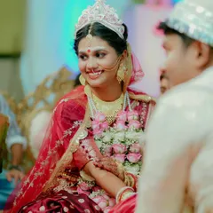 A candid, joyful smile from the bride during the ceremony. These unposed moments are the ones that truly capture the heart of the day.