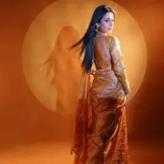 Another shot from the NDTV Marathi shoot with Isha Malviya. The backless blouse and flowing saree were complemented by sleek, straight hair and makeup that highlighted her features from every angle.