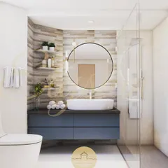 Another bathroom design, this one with a blue vanity and a round mirror. The space is bright and clean, with wood-look tiles on the accent wall adding warmth and texture.