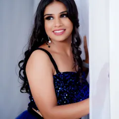 For this fashion portfolio shoot, I focused on creating a glamorous party makeup look. The look features sharp, winged eyeliner and soft curls to match the sparkling blue gown, perfect for an evening event or reception.