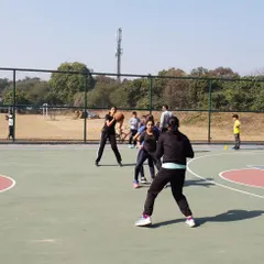 Mastering the fundamentals is crucial. This photo shows our female players practicing their triple threat stance, a foundational position that gives them the option to shoot, pass, or dribble effectively.