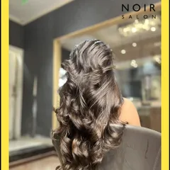 Good hair speaks louder than words. This beautifully styled updo with intricate curls showcases our expertise in creating elegant looks for any special occasion.
