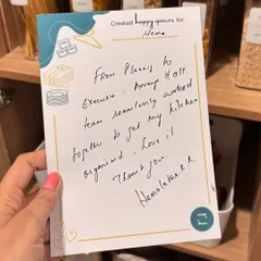 A handwritten note from a client after we organized her kitchen. She said, "From planning to execution, the team worked seamlessly together. Love it."