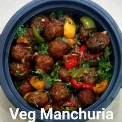 For those who enjoy Indo-Chinese flavors, I also make starters like this Veg Manchuria. These vegetable balls are tossed in a savory sauce with peppers and onions, making for a delicious appetizer.