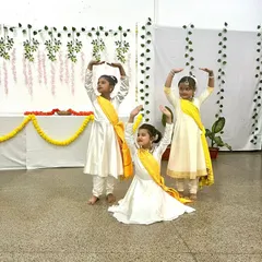 Our youngest budding stars preparing for their Kathak performance. We create a nurturing environment for children to develop balance, rhythm, and a love for our cultural heritage from an early age.