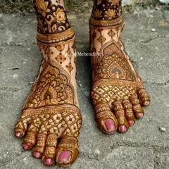A bride's look is complete only when her feet are adorned with beautiful mehndi. I create detailed patterns for feet that complement the designs on your hands, ensuring you look perfect from head to toe.