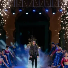 The groom's entry needs to have power and impact. Here, we designed a high-energy moment with cold pyro, smoke effects, and our backup dancers creating a pathway for a true star entrance.