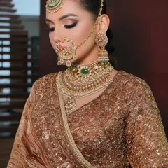 A close-up on the intricate draping and the stunning bridal jewellery. The way the dupatta falls is just as important as the outfit itself.