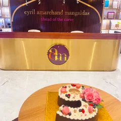 A beautiful cake in the shape of the number 9 at our Delhi NCR office reception, celebrating the 9th anniversary of Cyril Amarchand Mangaldas.