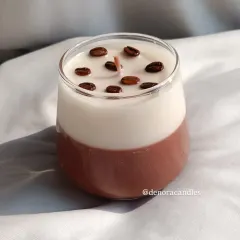 For all the coffee lovers, I've created this layered coffee candle. Topped with real coffee beans, this candle not only looks chic but also fills your space with the rich, comforting aroma of a fresh brew.