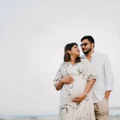 Another lovely shot from a beachside maternity session. Her makeup is kept fresh and minimal, ensuring the focus remains on the happy couple and this special time.
