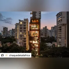 As evening descends on the city, the Sarvasva tower's integrated gardens are illuminated. This creates a warm, inviting presence and showcases the seamless blend of architecture and nature that defines our work.