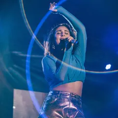 A magical moment on stage. The light trail effect in this photo adds to the electric energy of Dhvani's performance.