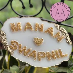 Another look at the classic white and gold geode style, this custom nameplate for Manan and Swapnil is a perfect housewarming gift.