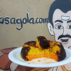 We've given the classic Odia Chhenapoda an innovative twist. This is our Satvik 3-Layer Chhenapoda, blending the traditional baked cheese cake with delicate notes of rose and vanilla for a truly unique dessert.