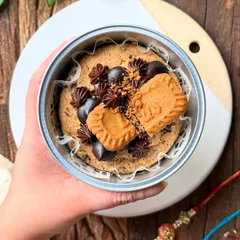 For a truly indulgent single-person treat, we offered this NYC-style cookie in a tin for Rakhi. This thick, gooey Biscoff-flavored cookie is a perfect, decadent gift for a sibling with a serious sweet tooth.