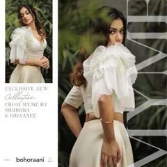 An exclusive look at our collection with Bohoraani, featuring a stunning white crop top with dramatic pleated tulle sleeves. This piece perfectly captures our blend of contemporary style and intricate design.
