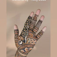 A single-hand view of the detailed peacock design, showcasing the delicate line work and shading that bring the bird to life. This is a classic and elegant choice for any celebration.