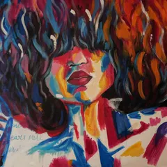 A direct, close-up shot of the colorful abstract portrait, allowing you to see the texture of the paint and the interplay of the different hues.