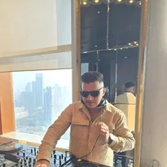 A sundowner session with a stunning city view in the background. I enjoy playing a more chilled-out set as the sun goes down before the party kicks off.