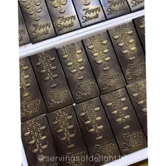 A closer look at the "Happy Diwali" chocolate bars. I use special molds and add a touch of edible gold dust to make them shine.