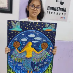 A young artist proudly shows off her imaginative and colorful mermaid painting. We help children bring their unique ideas to life on canvas.