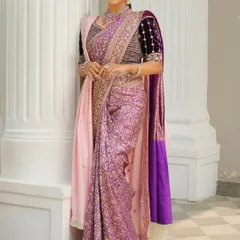 A full-length view of the elegant silk saree look. The makeup is kept soft and radiant, allowing the rich colors and textures of the saree to take center stage.