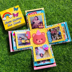 A closer look at the open birthday explosion box, showing the fun stickers and colorful paper I use to make each one feel special and personal.