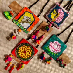 Here is a look at the variety of stories I love to tell through my art. This collection features four different hand-painted necklace sets, from the sacred Pichwai cow to the serene lotus flower, each with its own unique character and handcrafted details.