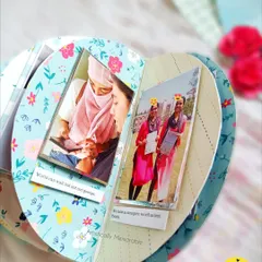 Inside the semicircle album, showing how the curved pages open up to reveal photos and notes about your friendship.