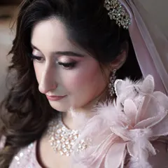 Aaliyah was the picture of timeless elegance on her engagement day. The soft blush hues, shimmering eyes, and flawless finish perfectly complemented her ethereal pink gown and radiant personality.