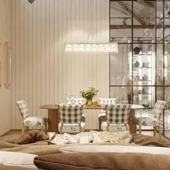 A cozy dining nook vignette within the store. The combination of patterned chairs, a rustic wood table, and glass partitions creates the feeling of stepping into a private dining room.