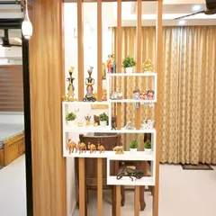 A perfect example of a functional partition. This design uses wooden slats to create a sense of separation for the dining area while the integrated white shelves offer a stylish space for curios.