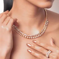 Diamonds should make even ordinary days feel extraordinary. This double-strand diamond necklace and matching ring are crafted to be remembered for a lifetime.