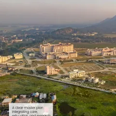 A clear master plan is the foundation of a successful medical campus, integrating care, education, and research. This aerial view showcases the organized layout of our campus projects, designed for phased growth and long-term adaptability.