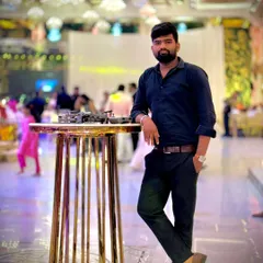 A portrait of me at a wedding event, ready for the next shot. I am personally on-site to ensure every flight and every piece of footage meets my standards.