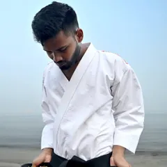 This black belt is a testament to the journey of a martial artist. It symbolizes the dedication required to master the forms of Karate, the throws of Judo, and the unwavering spirit needed to persevere through every challenge.