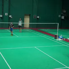 A typical training setup at our academy. We use multiple courts to ensure players get ample space and focused attention during drills.