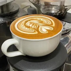 For the coffee lovers, we can set up a professional coffee bar at your event. Here is a perfectly crafted cappuccino with beautiful latte art, served fresh by our barista.