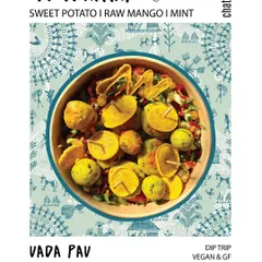 This is our tribute to a Mumbai icon: the Vada Pav. We turned it into a healthy, gluten-free salad with sweet potato fritters, chickpea flour mini pancakes, and fresh greens, served with minty cilantro and date tamarind dressings.