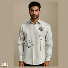 This shirt combines a classic light blue and white vertical stripe pattern with minimalist floral line art embroidery. It's a perfect example of how I blend traditional patterns with modern artistic touches for a sophisticated, breezy look.