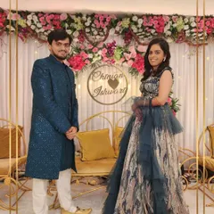 A bold and beautiful look for a modern couple. We love when our clients choose standout pieces like this sequined teal sherwani and abstract-print gown.