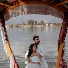 A quiet moment on a shikara in Kashmir. For Vidhi and Singh's pre-wedding shoot, we explored Dal Lake, capturing their serene connection amidst the unparalleled beauty of the valley.