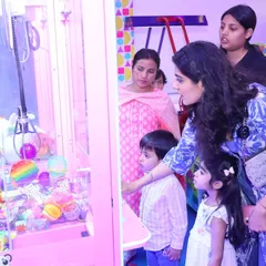 The claw machine is always a center of attention. Kids and adults love the thrill of trying to grab that perfect prize to take home.