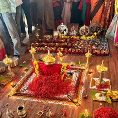The sacred setup for our Ghungroo Pooja ceremony. Every element, from the flowers and lamps to the idols of Lord Nataraja, is arranged to seek blessings for my students as they begin their formal dance journey.