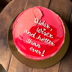 A cake with a bold statement: "Older, wiser, and hotter than ever!". Perfect for a milestone birthday.